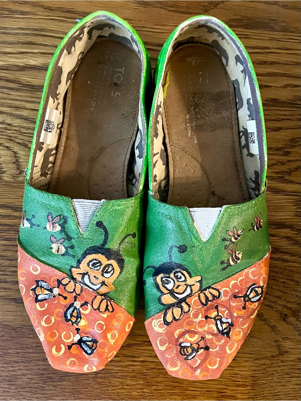 Toms Hand painted Green & Orange Bee Graphic Slip-On Shoes.